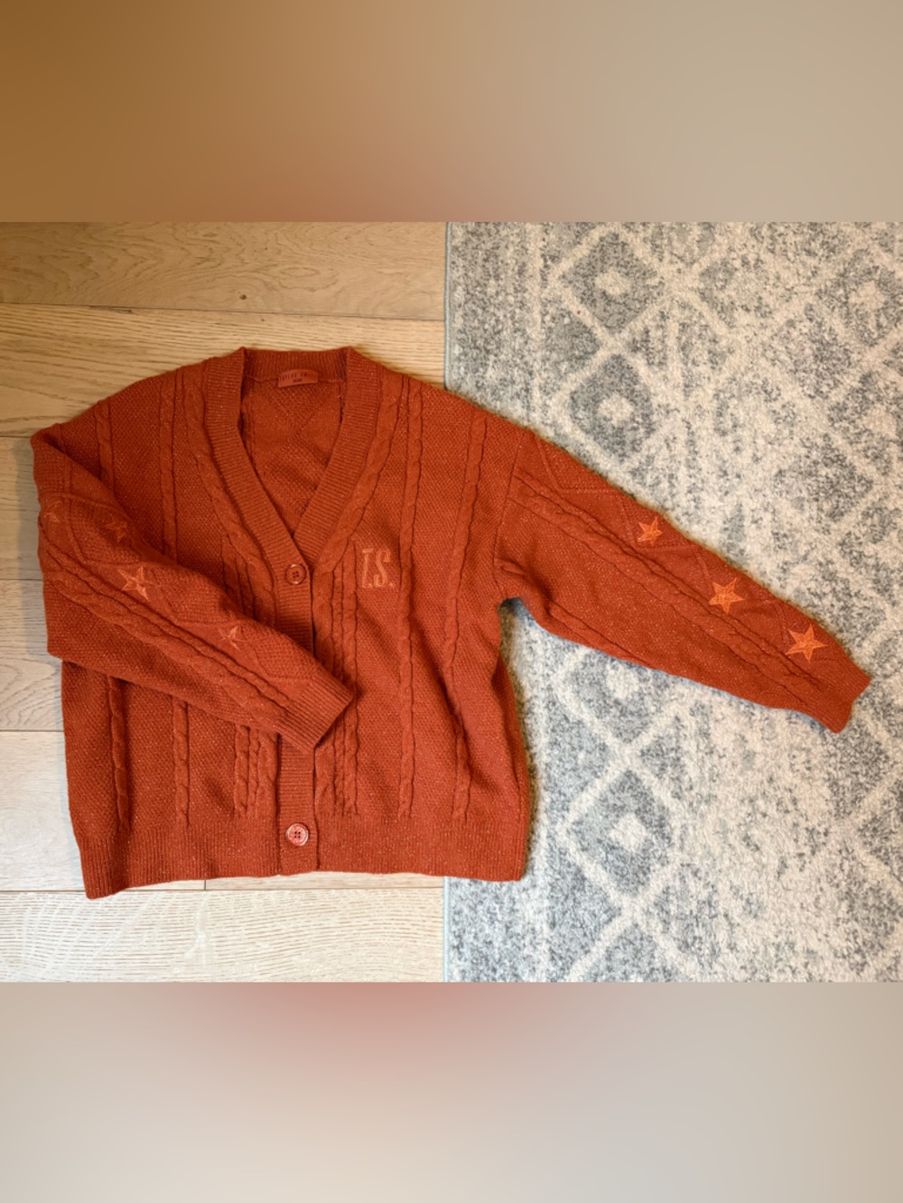 Life of a showgirl cardigan, like new. Xs/sm